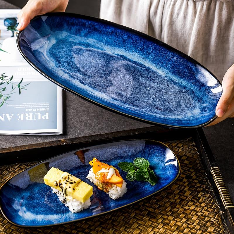 Eye Of Ocean Japanese Glazed Blue Long Plate with sushi display, showcasing ceramic craftsmanship and deep blue glaze.