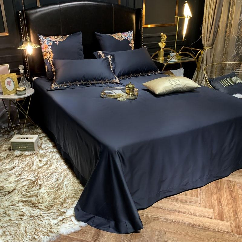 Luxurious bedroom with Royal Family Duvet Cover Set (Egyptian Cotton) in elegant dark theme decor