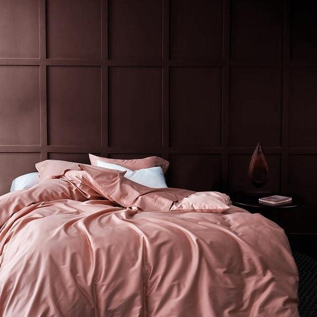 Venetia Duvet Cover Set 500TC Egyptian Cotton on a neatly made bed with elegant decor in background.