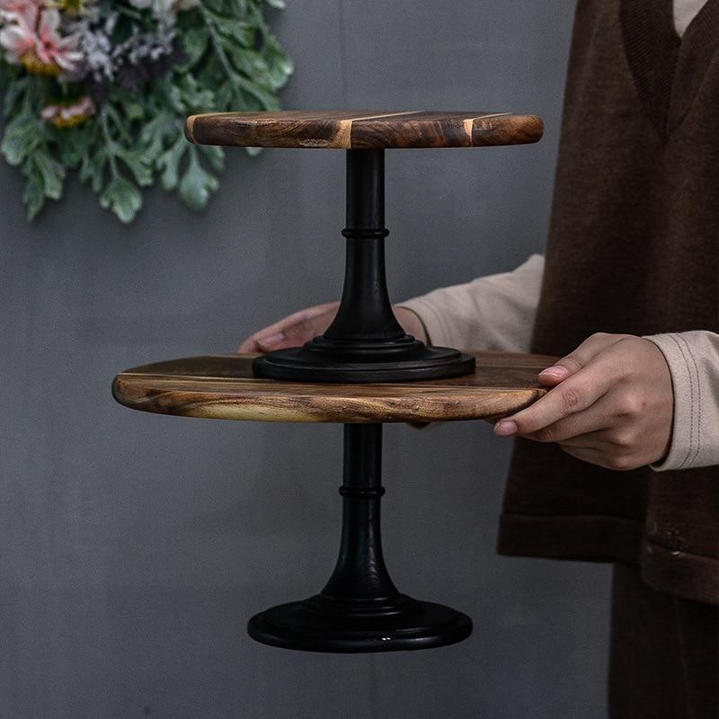 Two-tier Tall European Wooden Cake Tray with round wooden shelves and solid black stands.