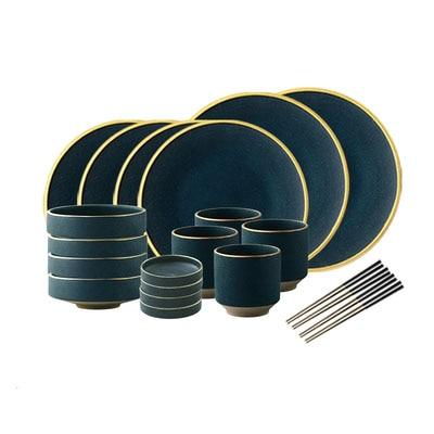 Galileo Tableware set featuring matte green plates with golden rings, artisan crafted porcelain, dishwasher and freezer safe.