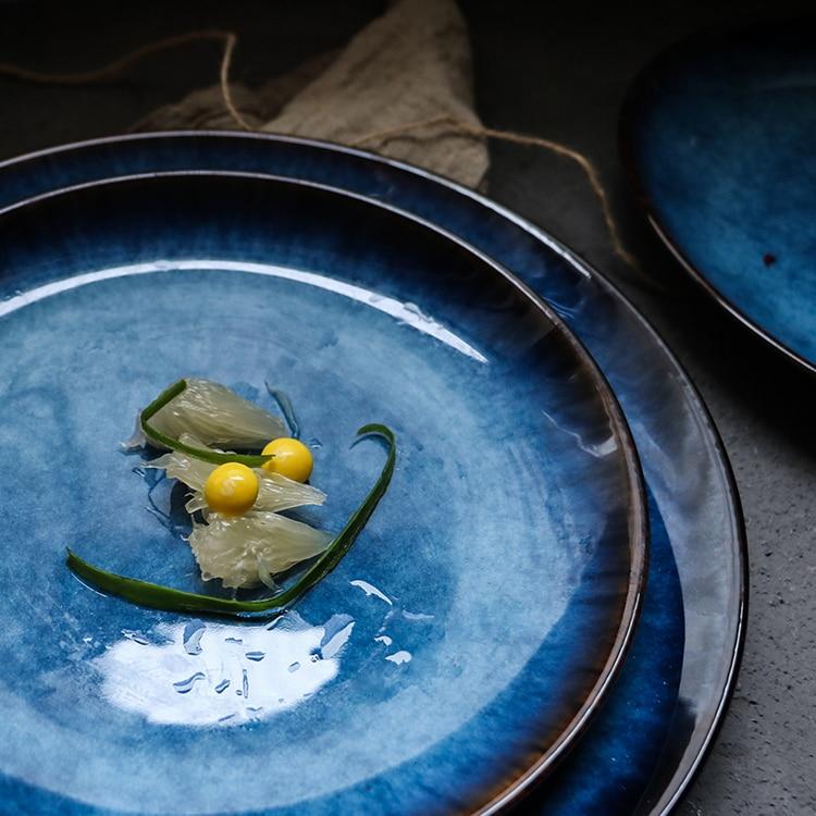 Handpainted Pallas Plate Set Of 4 with unique glazed ceramic design, perfect for elegant dinners and easy cleaning.