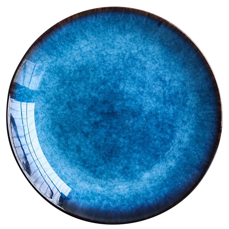 Pallas Plate Set Of 4 featuring a handpainted blue glazed ceramic round plate, ideal for elegant dining or everyday meals.