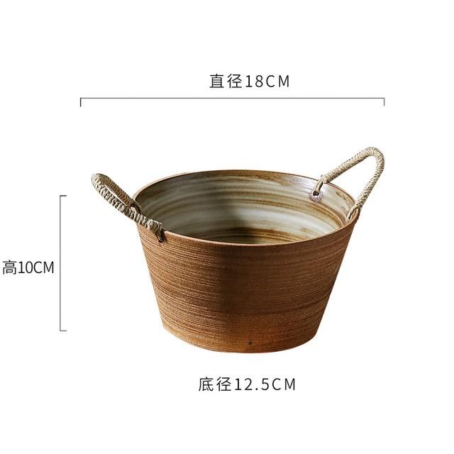 Hand-made Japanese Style Plates And Bowls featuring a round ceramic bowl with rope handles, measuring 18cm in diameter and 10cm in height.
