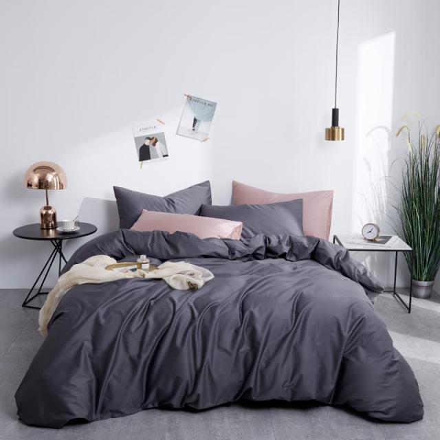 Graphite Grace Silk Duvet Cover Set (Premium Egyptian Cotton) 600TC on a bed with solid graphite color and soft texture.