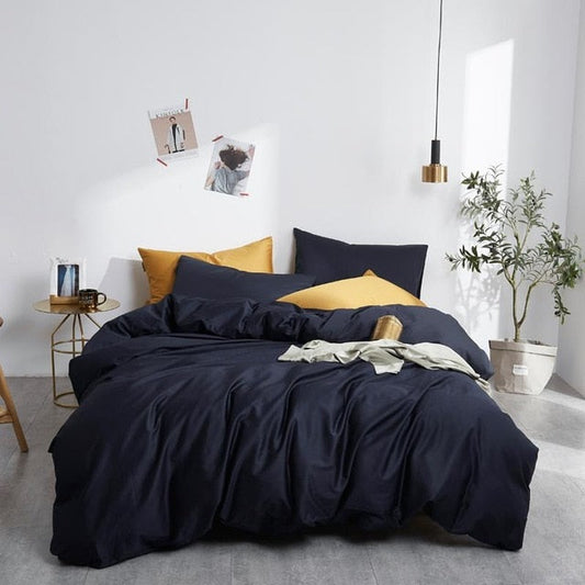 Navy Grace Silk Duvet Cover Set (Premium Egyptian Cotton) 600TC in a bedroom setting with modern decor and natural lighting.
