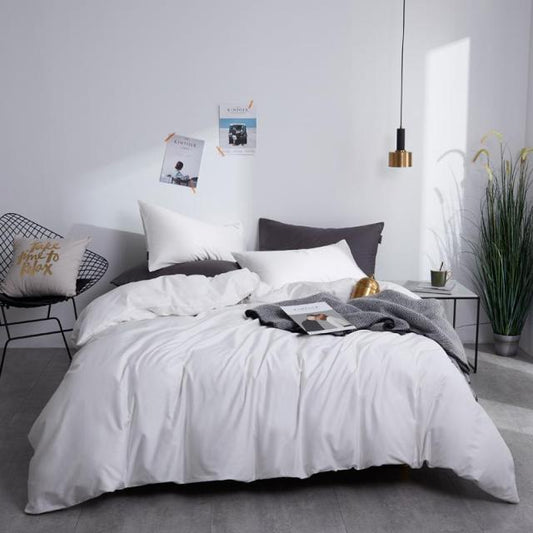 White Grace Silk Duvet Cover Set (Premium Egyptian Cotton) 600TC on a modern bed setting with pillows and decor in a contemporary bedroom.