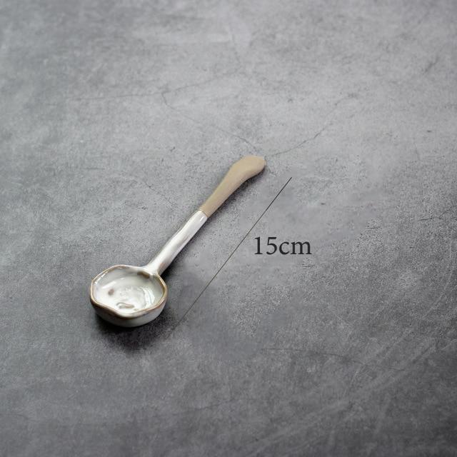 15cm spoon from Nanna Bowls And Dishes Thetis Tableware Set displayed on gray surface