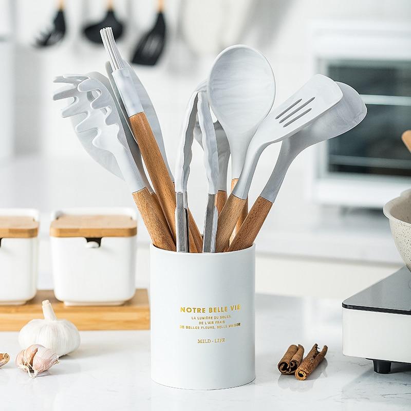 Premium Silicone Cooking Set Tools with wooden handles in kitchen
