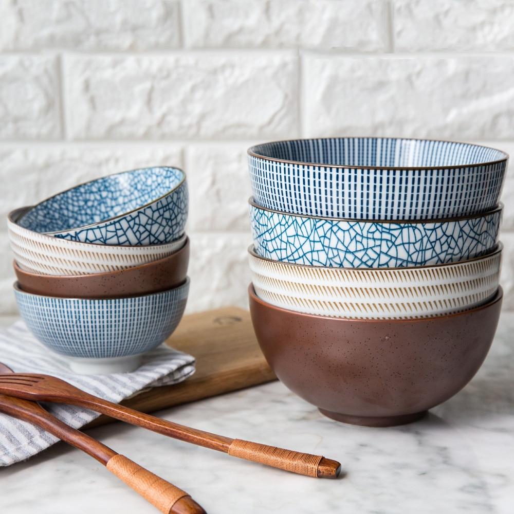 Elegant stack of Modern Japanese Ceramic Bowls, eco-friendly porcelain with under glazed design, showcasing various patterns and textures.