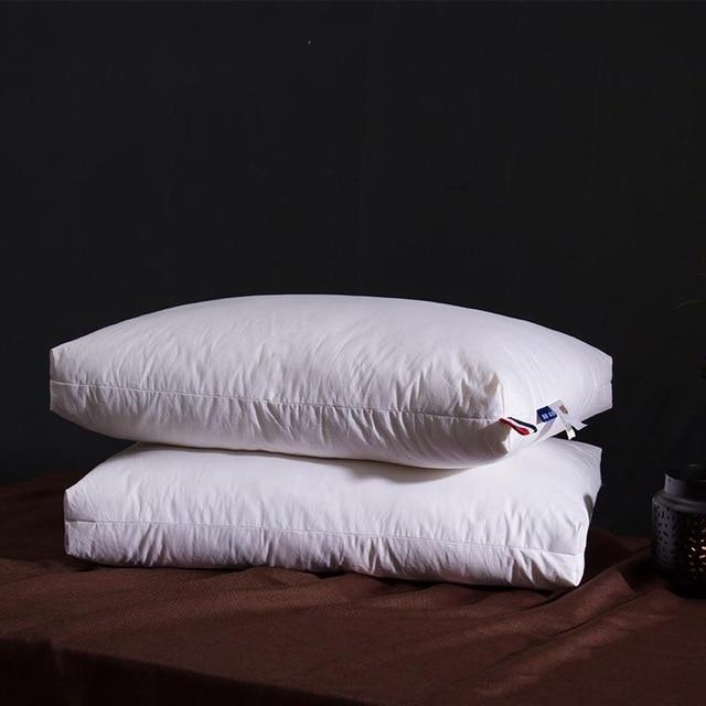 Giovanni Goose Down Pillows Cotton Made Set of 2 displayed on a bed, offering comfort and style for any bedroom decor.