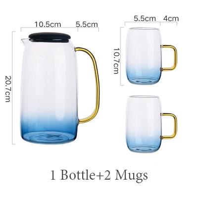 Colored Glass Carafe and Glass Set with blue gradient design, featuring a round eco-friendly carafe and two matching mugs.