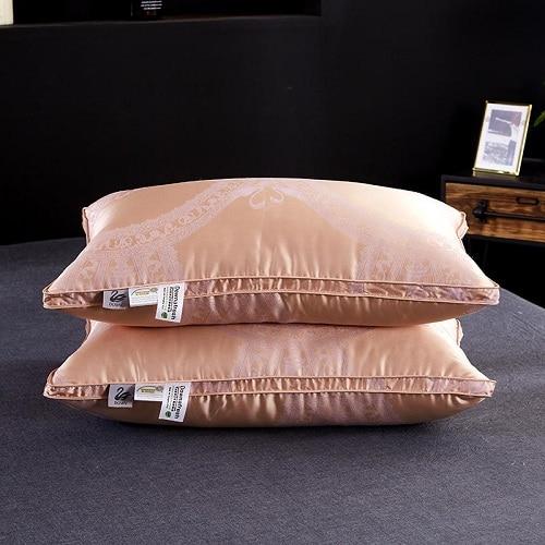 Vincenzo Pillows Set of 2 Goose Down in soft pink fabric, showcasing elegant texture, perfect for complementing Egyptian cotton bedding.
