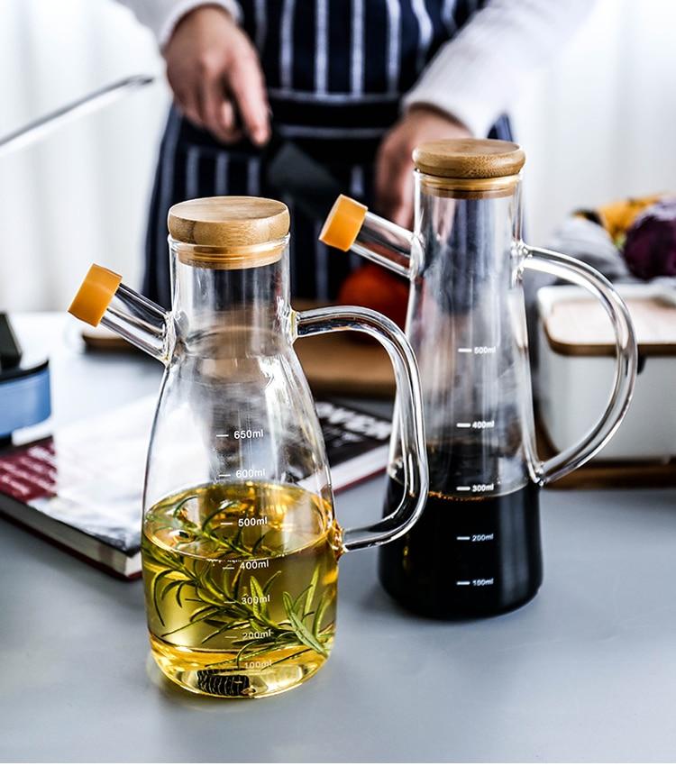 Modern Heat-Resistant Oil Bottle made from eco-friendly glass, featuring round shape and engraved design with certifications.