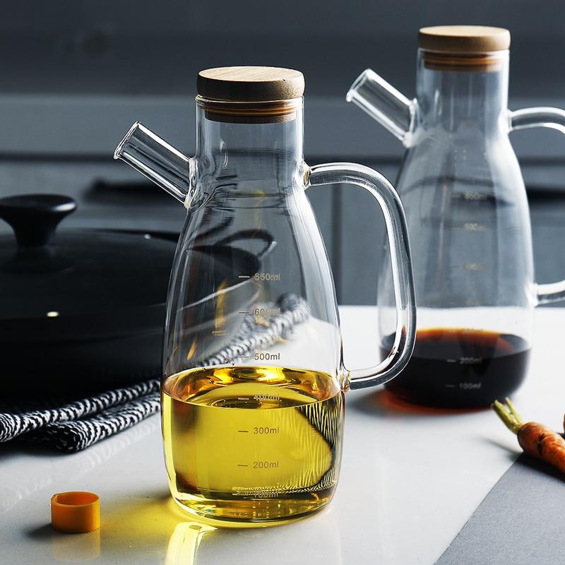 Modern Heat-Resistant Oil Bottle with eco-friendly engraved glass design, featuring wooden lid and precise measurement markings.