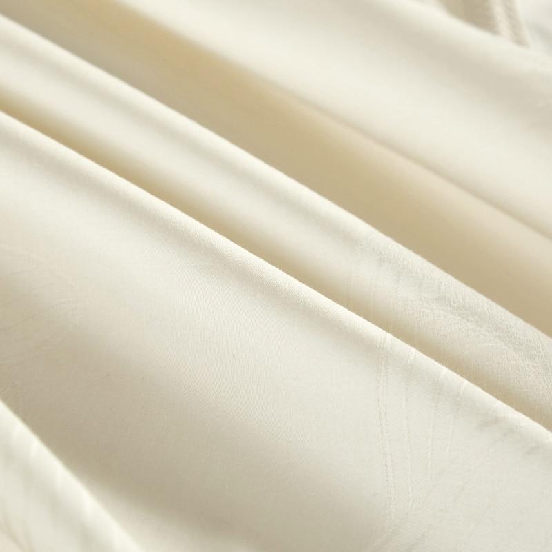 Close-up of Warm White Lancelot Duvet Cover Set (Premium Egyptian Cotton) (Jacquard) showcasing its luxurious texture.