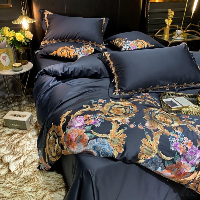 Luxurious Royal Family Duvet Cover Set (Egyptian Cotton) in a stylish bedroom setting with floral embroidery on a cozy bed.
