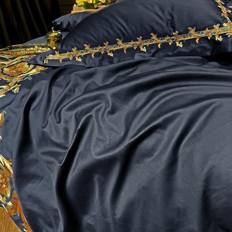 Royal Family Duvet Cover Set (Egyptian Cotton) in dark blue with gold embroidery, ultra soft and luxurious bedding for comfort.