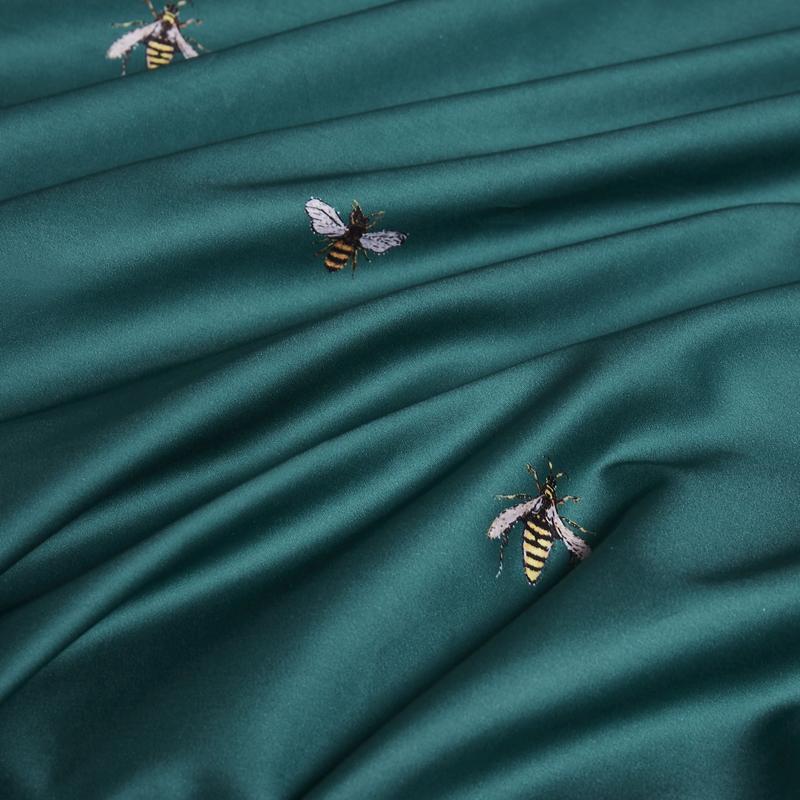 Green fabric with embroidered bee design on D'Artagnan Duvet Cover Set (Egyptian Cotton)