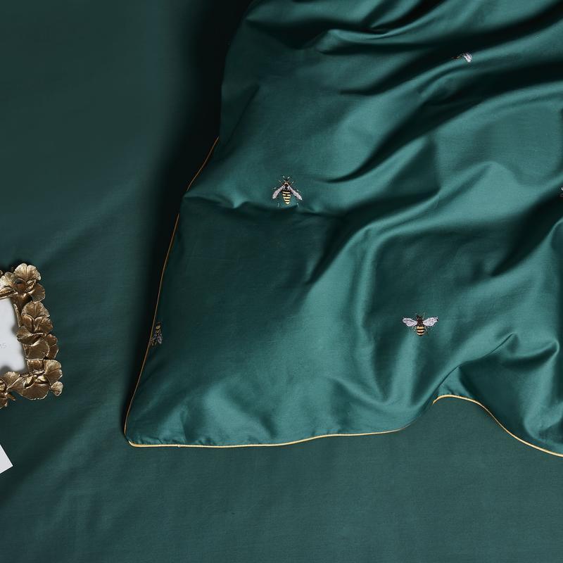 D'Artagnan Duvet Cover Set (Egyptian Cotton) in deep green with elegant bee embroidery, showcasing luxury and understated elegance in bedding.