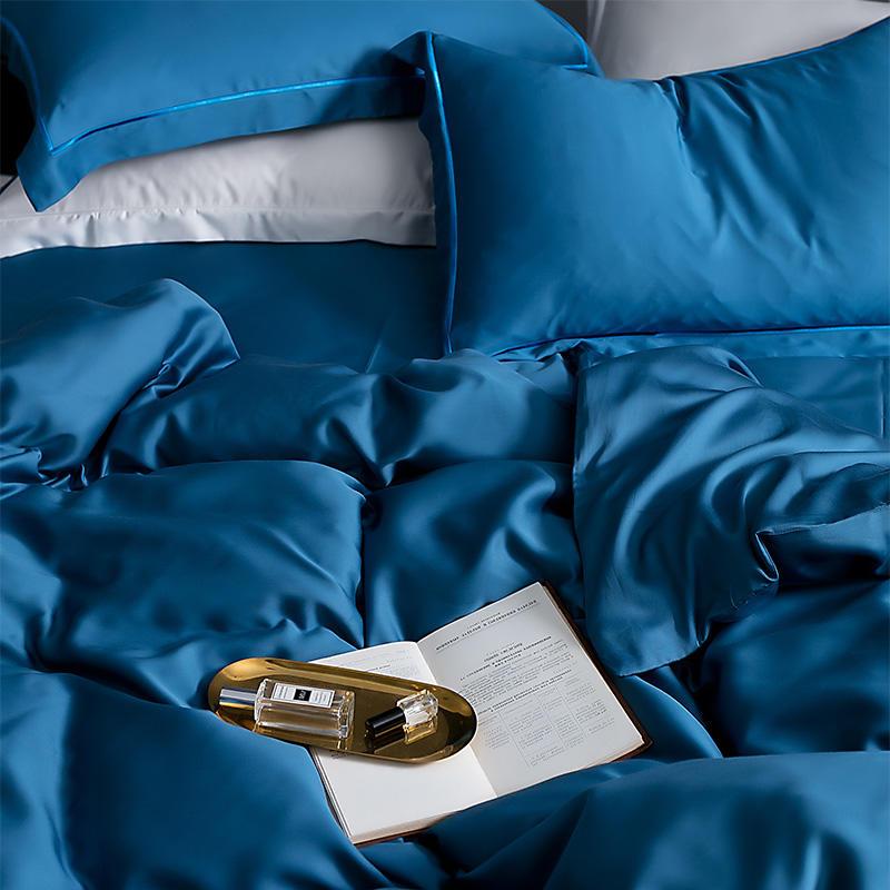 Karen Solid Color Lyocell Duvet Cover Set in rich blue, showcasing soft Tencel Lyocell fabric with a modern and boho style design.