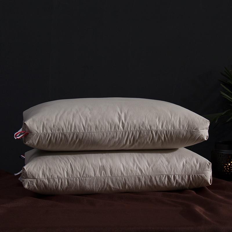 Giovanni Goose Down Pillows Cotton Made Set of 2, showcasing plush white pillows on a dark bed for ultimate bedroom luxury and comfort.