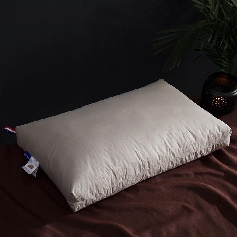 Giovanni Goose Down Pillows Cotton Made Set of 2 displayed on a dark bed with elegant bedding.