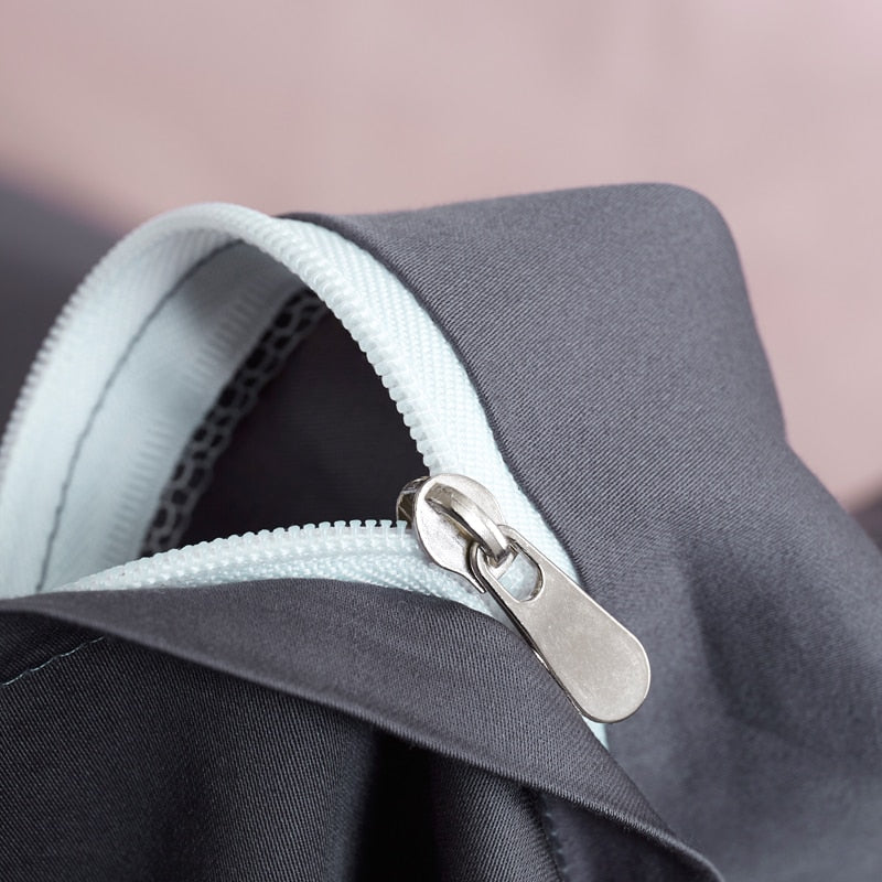 Close-up of zipper on Graphite Grace Silk Duvet Cover Set (Premium Egyptian Cotton) 600TC, showing detailed craftsmanship.