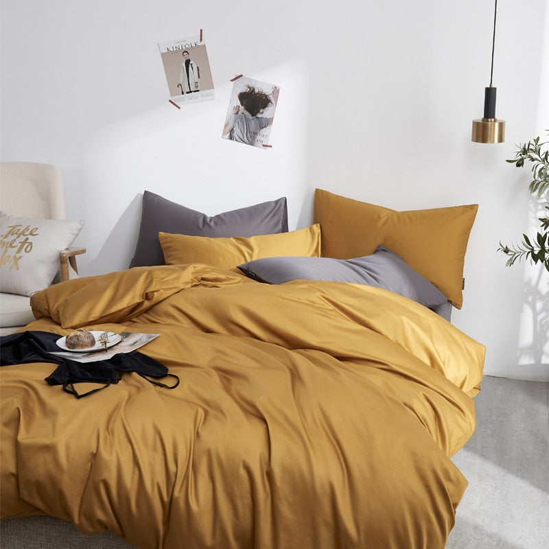 Butterscotch Grace Silk Duvet Cover Set (Premium Egyptian Cotton) 600TC on a styled bed with mustard color bedding.