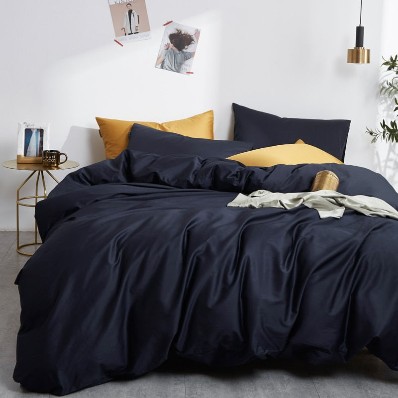 Navy Grace Silk Duvet Cover Set (Premium Egyptian Cotton) 600TC on a bed with stylish pillows showcasing luxury and comfort.