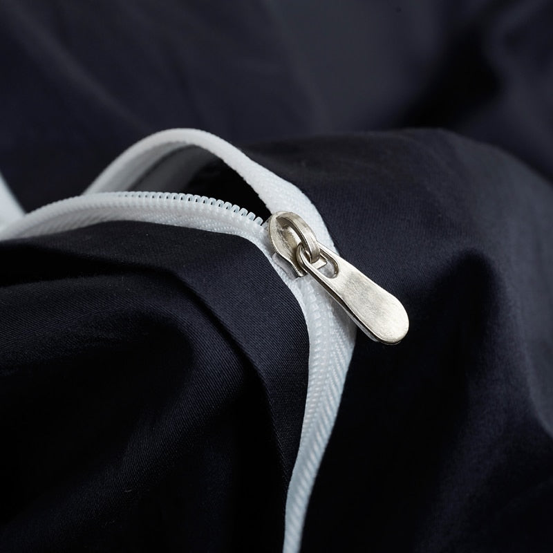 Close-up of zipper detail on Navy Grace Silk Duvet Cover Set (Premium Egyptian Cotton) 600TC in navy color.