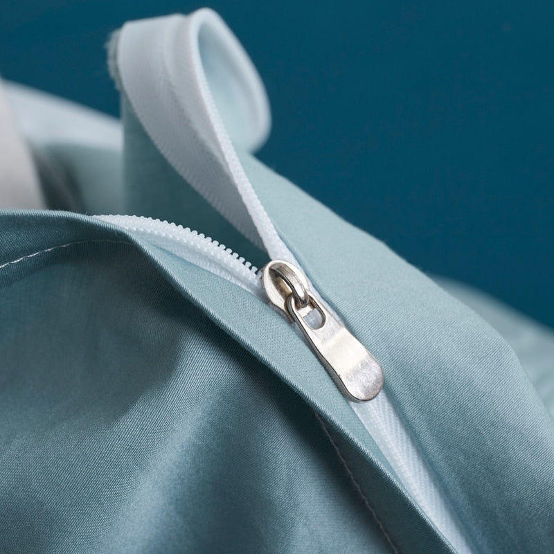 Close-up of zipper on Turquoise Grace Silk Duvet Cover Set (Premium Egyptian Cotton) 600TC, showing silky texture and quality stitching.