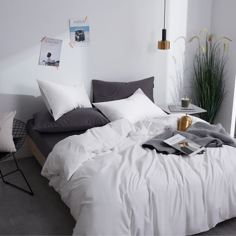 Luxurious bedroom with White Grace Silk Duvet Cover Set (Premium Egyptian Cotton) 600TC on a modern bed, enhancing decor elegance.