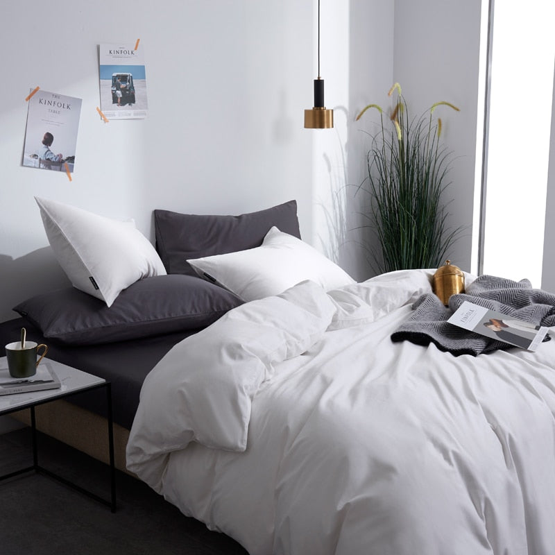 Luxurious bedroom featuring White Grace Silk Duvet Cover Set (Premium Egyptian Cotton) 600TC with pillows and decor accents.