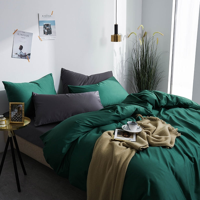 Green Grace Silk Duvet Cover Set (Premium Egyptian Cotton) 600TC on a bed with pillowcases and a cozy bedroom setting.