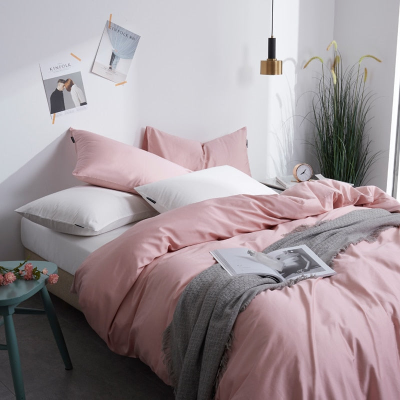 Flamingo Grace Silk Duvet Cover Set (Premium Egyptian Cotton) 600TC in pink on a styled bedroom setup with pillowcases and flat bed sheet.