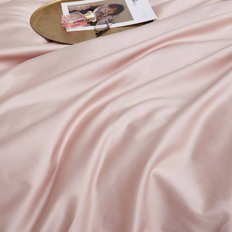 PeachPuff Grace Silk Duvet Cover Set (Premium Egyptian Cotton) 600TC on bed with magazine and glasses