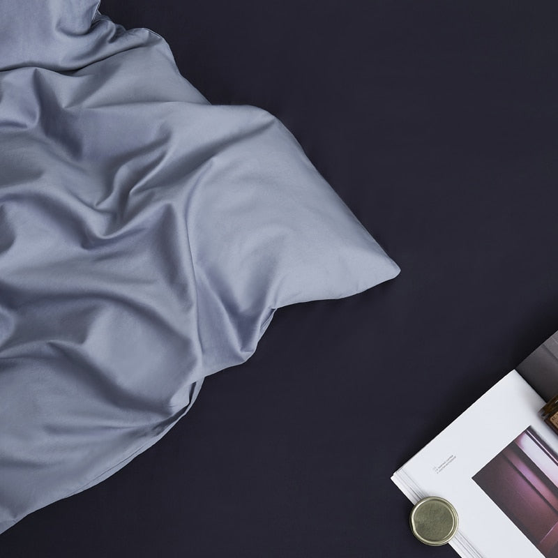 Florentine Grace Silk Duvet Cover Set (Premium Egyptian Cotton) 600TC in elegant blue spread on a dark background.