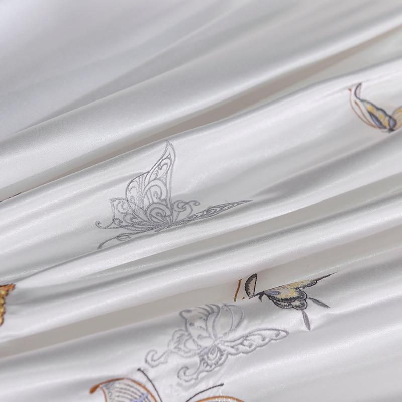 Platinum Butterfly Duvet Cover Set in satin and cotton with minimalist butterfly print for a classic bedroom decor.