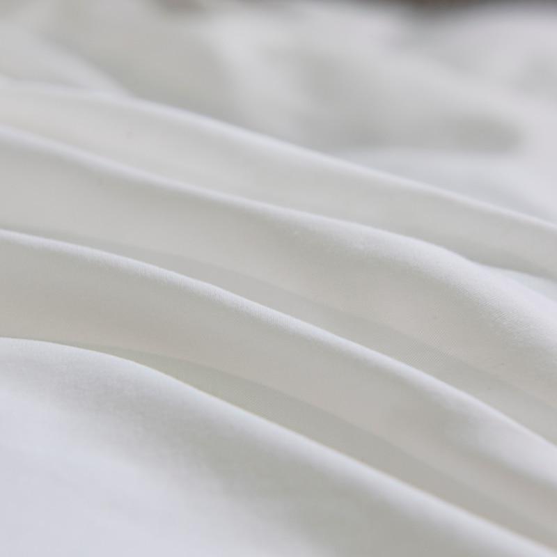 Close-up of minimalist satin fabric for the Platinum Butterfly Duvet Cover Set, highlighting its texture and quality.