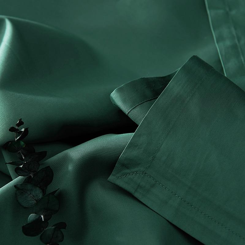 Luxurious Venetia Duvet Cover Set 500TC Egyptian Cotton in elegant green, adding modern touch and softness to bedroom decor.