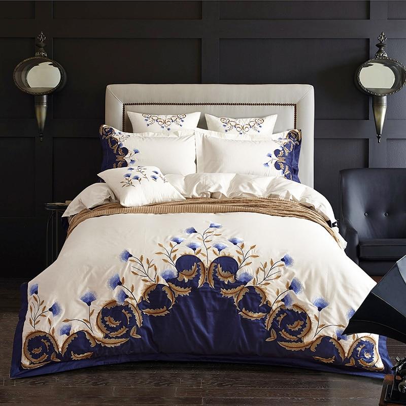 Blue Tail Luxury Duvet Cover Set (60S Egyptian Cotton) in a stylish bedroom setting with elegant floral design.