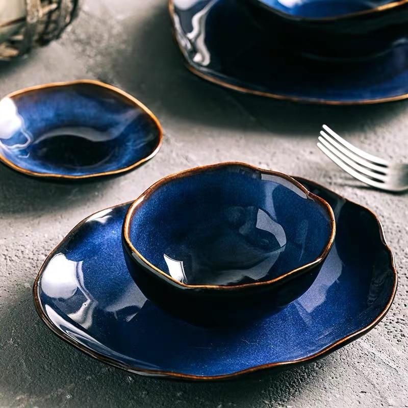 Blue European Porcelain Dinnerware Set (Plates and Bowls) from Amelia Collection, featuring hand-painted dark blue porcelain pieces.