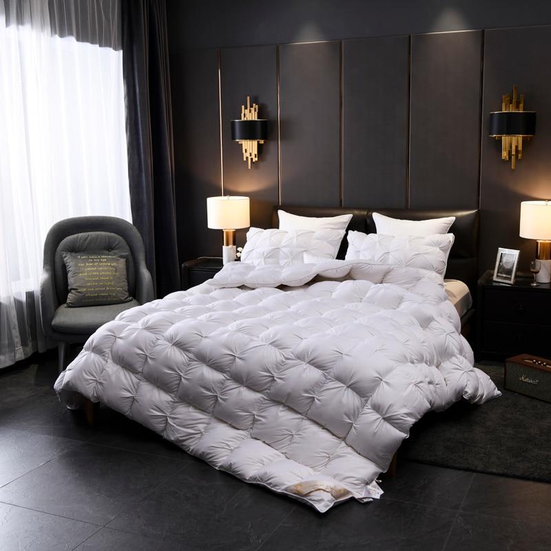 Elegant bedroom featuring Giuseppina 1000 Thread Count Goose Down Comforter Duvet on a luxurious bed setting.