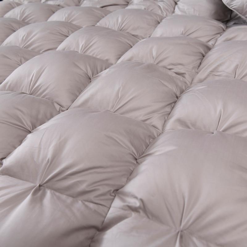 Giuseppina 1000 Thread Count Goose Down Comforter Duvet displayed in elegant bedroom setting.
