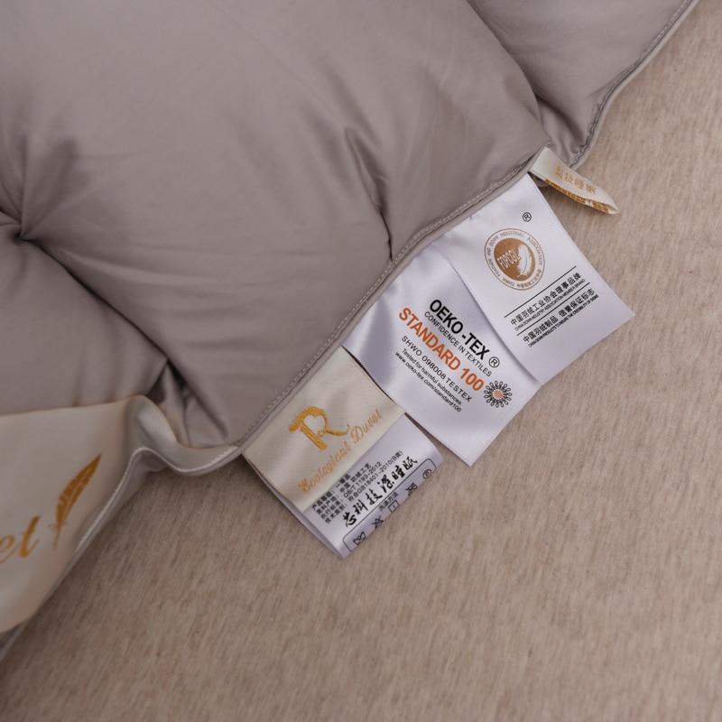 Giuseppina 1000 Thread Count Goose Down Comforter Duvet showing quality labels and fabric detail.