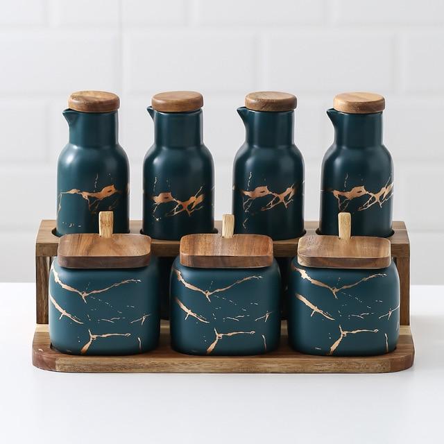 Maci 8-Piece Spice Ceramic Jar With Wooden Lid set for herb and spice storage on table