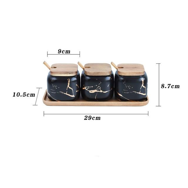 Maci 8-Piece Spice Ceramic Jar With Wooden Lid on display with measurements