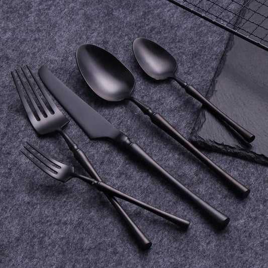 Evangeline Matte Flatware Set 24-Piece with modern skeleton shapes and matte finish, includes forged stainless steel cutlery.