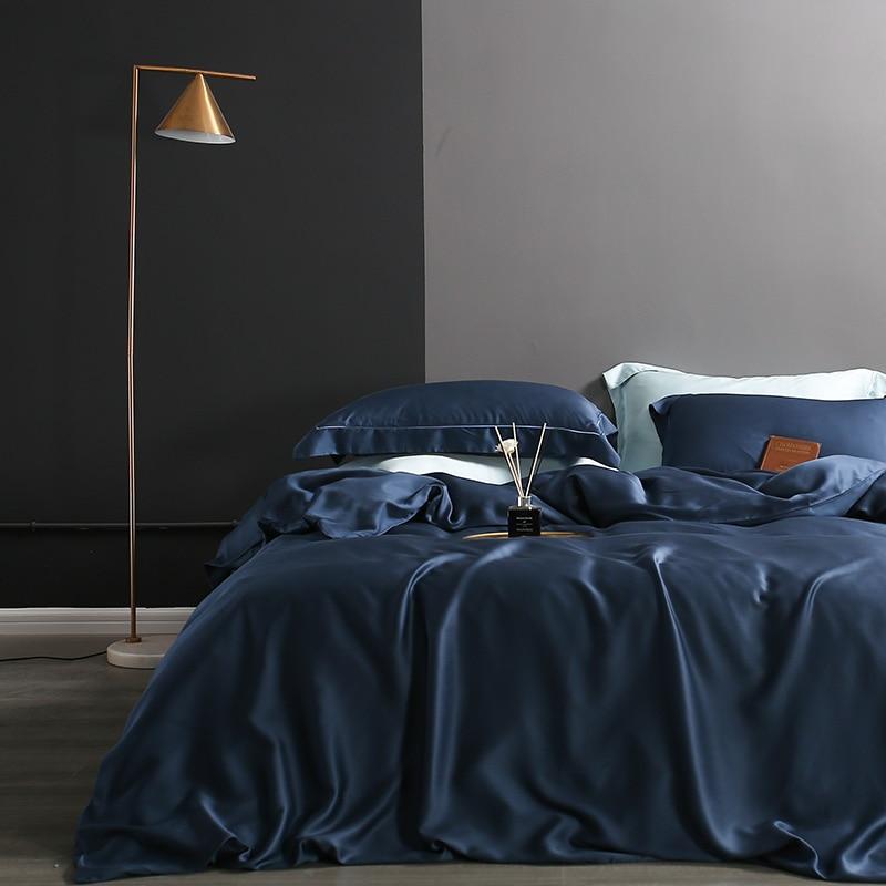 Karen Solid Color Lyocell Duvet Cover Set in blue with modern and boho style, featuring soft Tencel fabric and elegant bedroom decor.